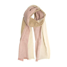 Load image into Gallery viewer, Introducing the Cozy Scarves, a beautifully designed accessory showcasing a color block pattern in blush pink, cream, and tan. This stylish scarf boasts an irresistibly soft woven texture with elegant herringbone and striped patterns. Its artistic draping highlights both warmth and contemporary fashion.
