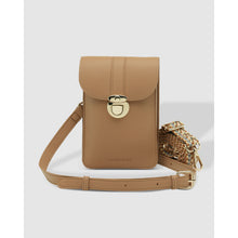 Load image into Gallery viewer, The Fontaine Phone Bag, crafted in tan leather, showcases a flap cover with a gold clasp and features adjustable straps highlighted by gold chain accents and braided detailing. A subtle shadow behind the bag against a light gray background adds to its elegant appeal.
