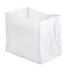 Load image into Gallery viewer, The white, rectangular Porcelain “Paper Bag” Vase, with an open top and crumpled texture, stands upright on a plain white background. Its slightly creased sides give it the appearance of handcrafted porcelain art resembling a unique vase.
