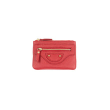 Load image into Gallery viewer, A compact rectangular leather wallet in a vibrant red color, showcasing a grainy texture. It includes a functional gold zipper pocket on the front adorned with a small tassel and accented with two gold rivets below the zipper. This stylish accessory, named the Leather Wallet with Keychain, is presented against a plain white background.
