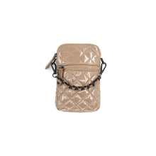 Load image into Gallery viewer, The Patent Quilted Cellphone Bag is a stylish accessory featuring a shiny beige, quilted design with a diamond pattern. It includes a front zip pocket and a black chain strap, crafted from luxurious nylon material. The circular zipper pull adds charm, while metal hooks attach the strap on each side, highlighted against a white background to accentuate its elegance.
