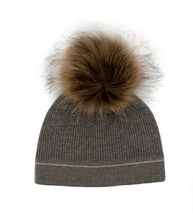 Load image into Gallery viewer, A gray Knit Beanie with Crystal Contrast Line features a luxurious fox fur pom-pom on top. The beanie showcases a ribbed texture and a subtle metallic stripe near the edge, providing a striking contrast to the sleek, soft fabric of the beanie.
