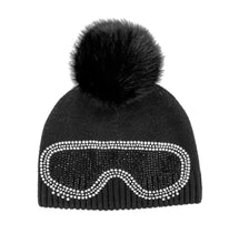 Load image into Gallery viewer, The Knit Beanie with Crystal Ski Goggles &amp; Fox Fur Pom-Pom showcases a striking black design, highlighted by a large fox fur pom-pom on top. The front is adorned with sparkling rhinestone embellishments in the shape of ski goggles, offering both charm and fun. A ribbed texture along the bottom edge guarantees a secure and comfortable fit.
