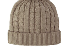 Load image into Gallery viewer, The Cable Knit Beanie with Fleece Lining in beige showcases a ribbed fold-over cuff and an exquisite pattern design. Its seamless, rounded top and soft, textured yarn provide a cozy yet stylish look. The plain white background accentuates its detailed craftsmanship and fashionable appeal.
