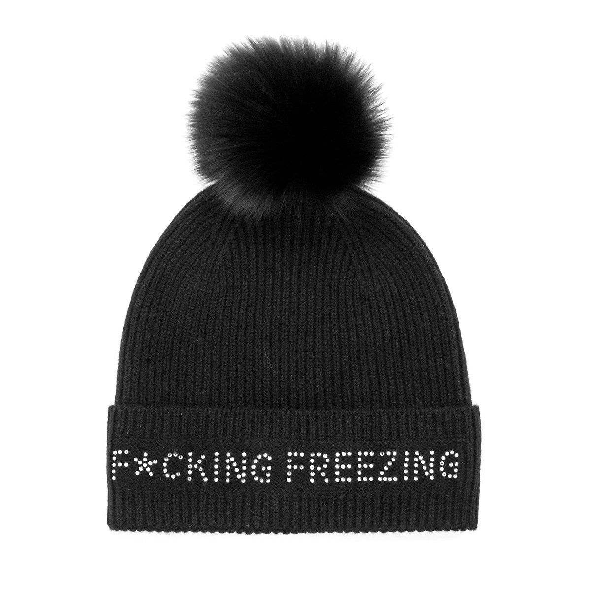 The "F*cking Freezing" Knit Beanie with Fox Pom-Poms showcases a black design with a large, fluffy fox pompom on top. The cuff features white rhinestones spelling out "F*CKING FREEZING" in capital letters. It has a soft and warm texture, providing both style and comfort for chilly days.