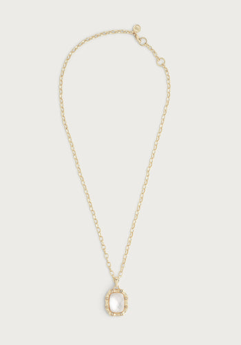 Introducing the Bamboo with Stone Pendant Necklace - Mother of Pearl: This exquisite necklace features a sturdy 18k gold dipped brass chain with evenly spaced links and an adjustable clasp. At its center, a single oval bamboo pendant showcases a polished mother of pearl stone framed by an ornate gold border, all set against a plain, light background.