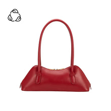 Load image into Gallery viewer, The Dakota Recycled Vegan Shoulder Bag, made from eco-friendly materials, is shown on a white background. It has an elongated shape, thin handles, a gold zipper, and minimalist elegance. The top left corner displays a small logo. Its OEKO-TEX certified lining enhances its sustainable luxury.
