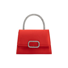 Load image into Gallery viewer, The Sadie Satin Top Handle Bag in vibrant red boasts a silver textured handle with rhinestones and an elegant buckle, enhancing its minimalist design. The white background highlights the bag&#39;s sophisticated look, perfect for adding glamour to any ensemble.
