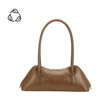 Load image into Gallery viewer, The Dakota Recycled Vegan Shoulder Bag, designed with a minimalist brown tone and double handles, features a gold zipper closure. Made from recycled vegan leather, it is compact yet spacious. Displayed on a white background with a black recycling symbol in the upper left corner.
