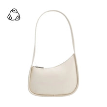 Load image into Gallery viewer, The Willow Recycled Vegan Shoulder Bag is a minimalist cream-colored handbag with a sleek, curved design. It features a single strap for easy shoulder wear and a top zipper closure, showcasing smooth edges and an eco-friendly recycling symbol on its plain white background.
