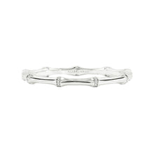 Load image into Gallery viewer, The Bamboo Hinged Bangle - Silver features textured nodes and smooth segments on a soft gray backdrop. Engraved with &quot;Michael Aram,&quot; this sterling silver-dipped brass piece embodies minimalist elegance.
