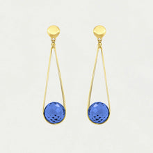 Load image into Gallery viewer, The Mini Ipanema Earrings are stunning gold drop earrings featuring round tops and dangling open teardrop loops, each adorned with an ethically sourced, checkered-cut blue gemstone. Their minimalist design shines effortlessly against a plain white background.
