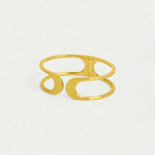 Load image into Gallery viewer, The Crosby Midi Cuff is a gold-colored, open cuff bracelet with a modern abstract design. Its 22-karat gold highlights fluid asymmetrical loops, broadening at one end and tapering at the other. Lightweight and polished, it reflects light for a glossy look against a plain background.
