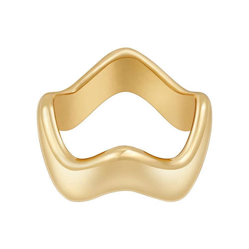 The Wavy Band Ring, gold-plated with a smooth, wavy design, is displayed against a white background. The band features gentle curves resembling waves or undulating hills, offering a modern and elegant look. Its polished surface beautifully reflects light, highlighting its shiny finish and tarnish-resistant quality.