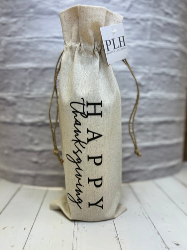 The Happy Thanksgiving Wine Bag is custom-designed from a cotton/linen blend and showcases 